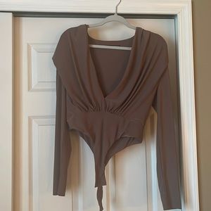 Longe sleeve silk purplish bodysuit with plunge neckline
